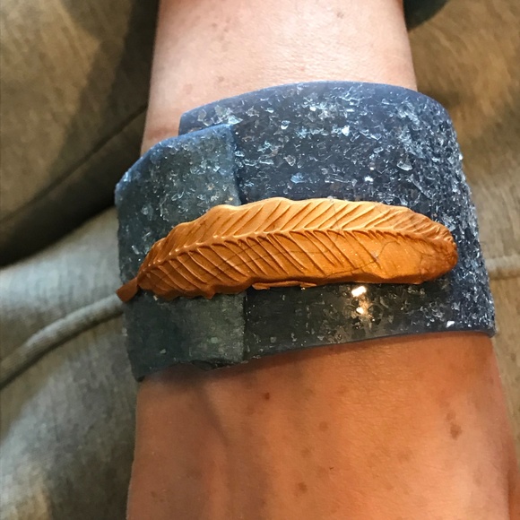 Matana chasing a feather Bird bangle in Denim - Picture 7 of 8